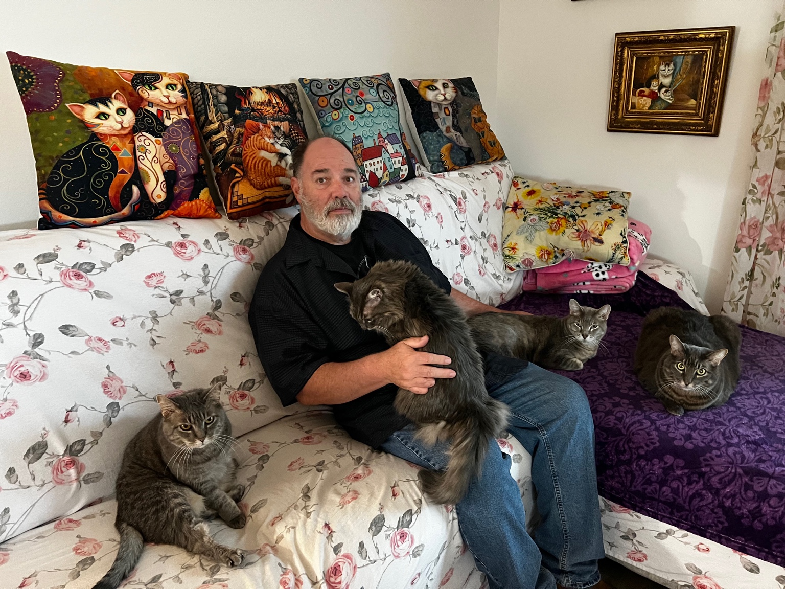 Paul with his beloved cats